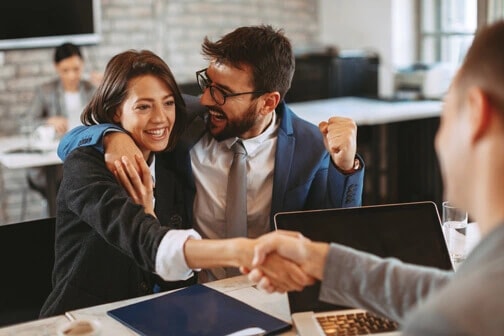 Consultants celebrating a successful close